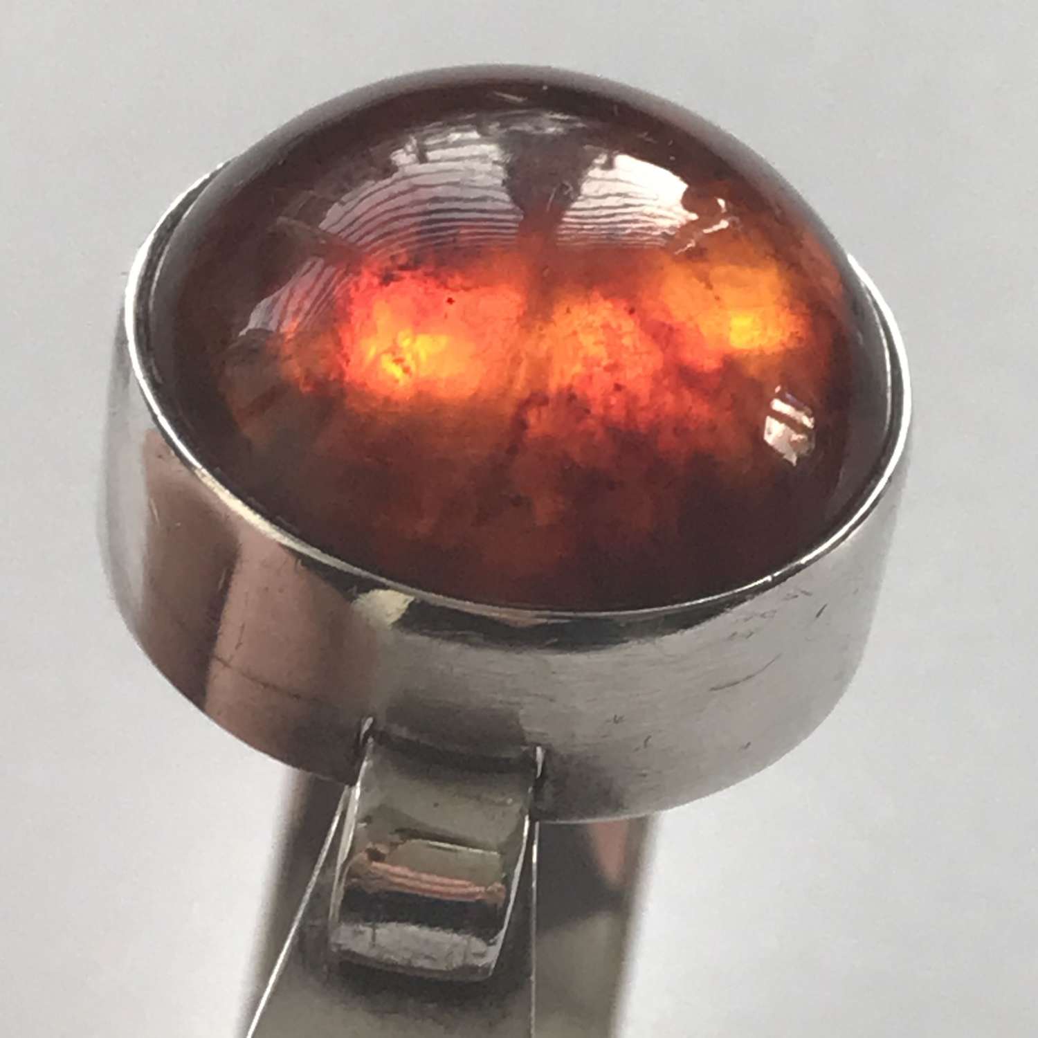 Niels Erik From bangle/ arm ring with amber cabochon, Denmark 1960-70s
