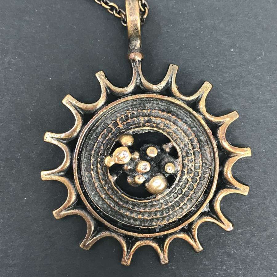 Bronze sunburst pendant by Jorma Laine, Finland c1970s