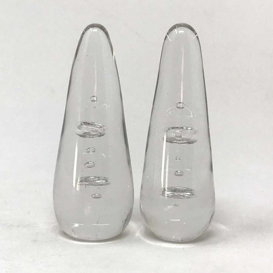 Two Wedgwood colourless glass paperweights with bubbles