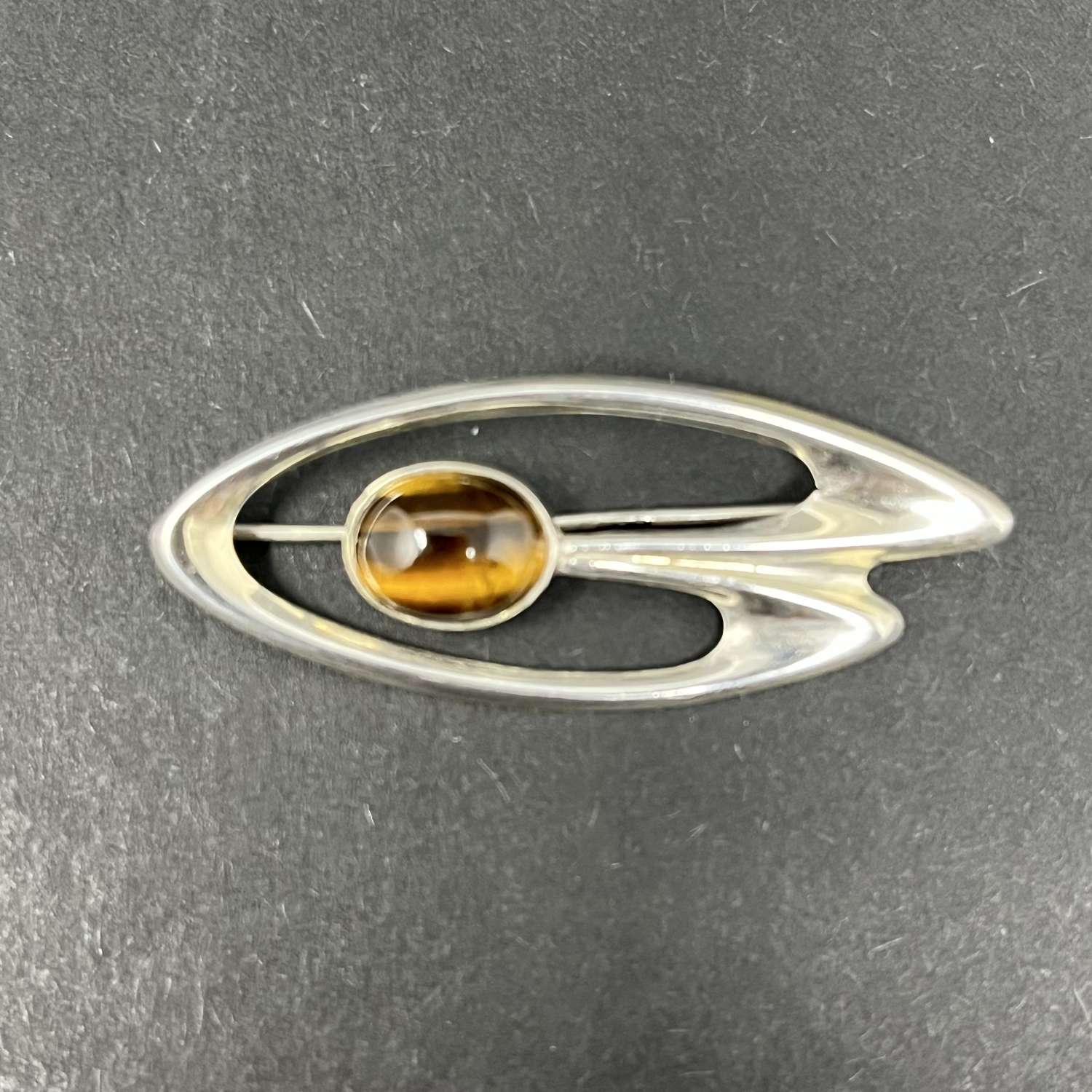 Modernist brooch with tiger's eye cabochon, Finland c1960s